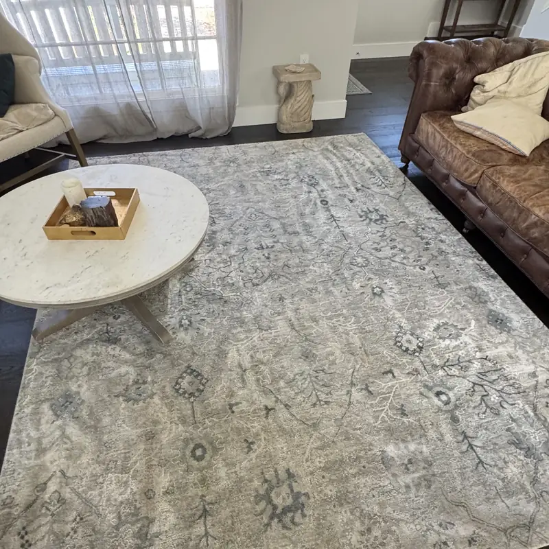 Blue and cream patterned rug after cleaning, pattern contrast restored