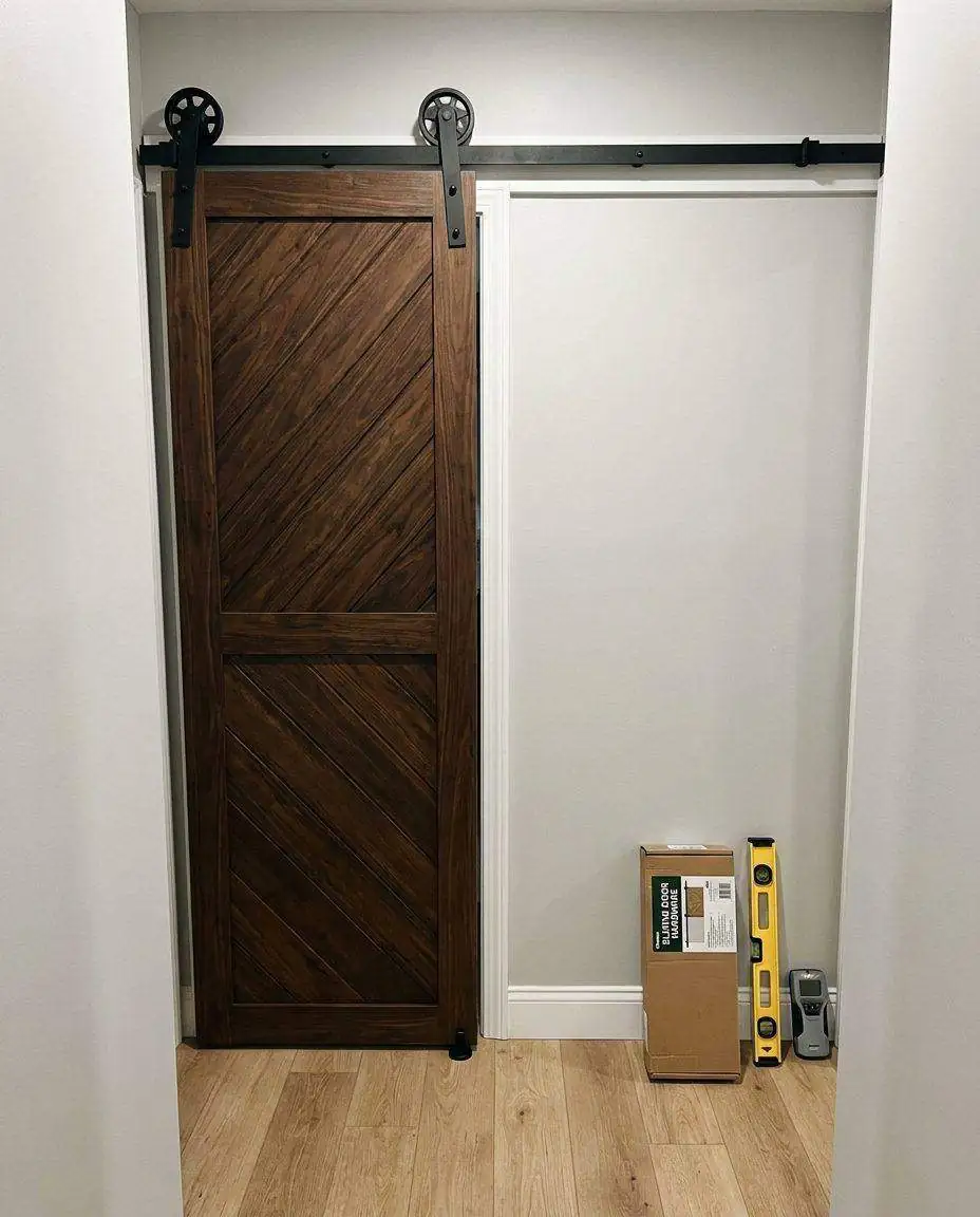 Sliding barn door installed on a rail