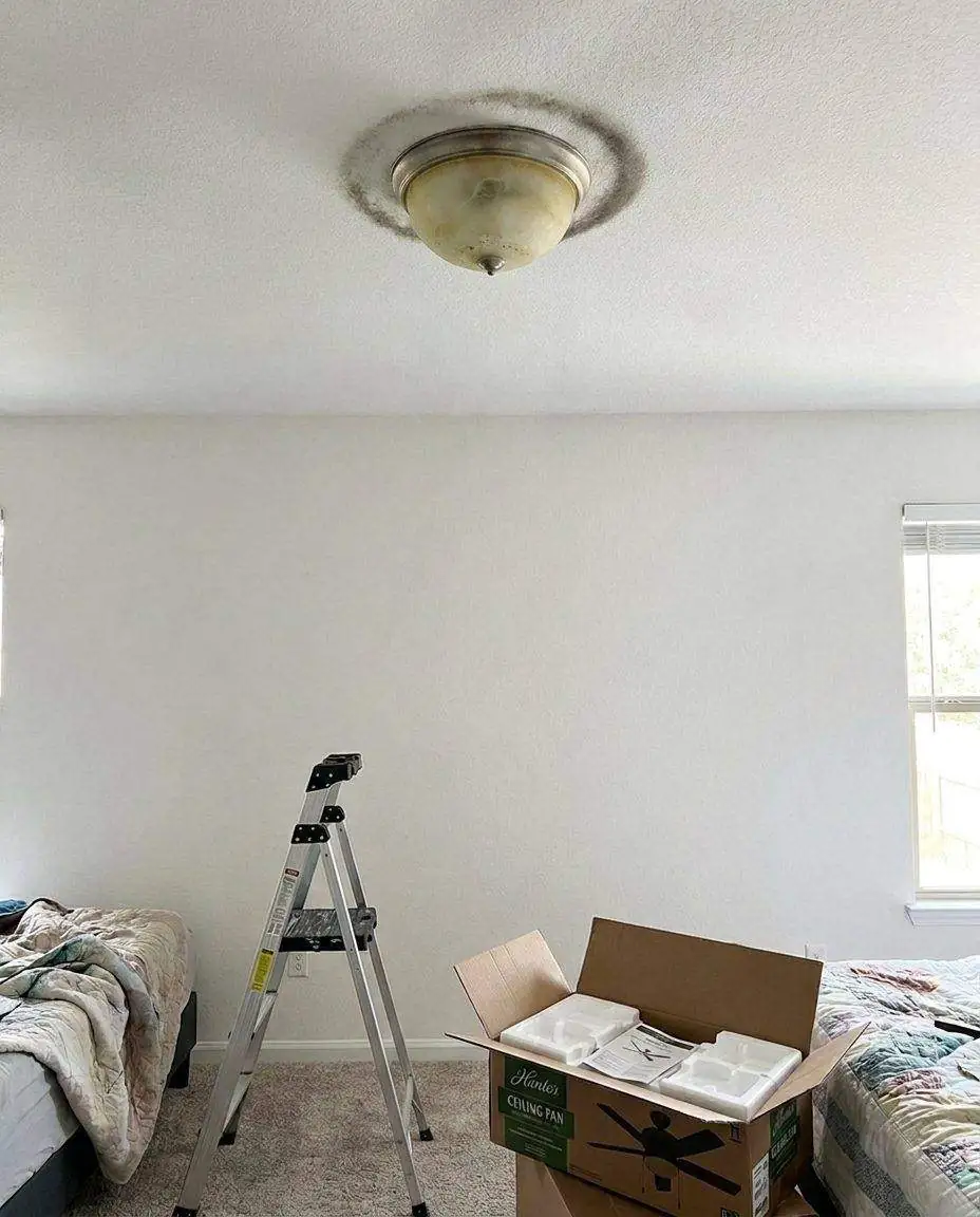 Old light fixture before ceiling fan installation