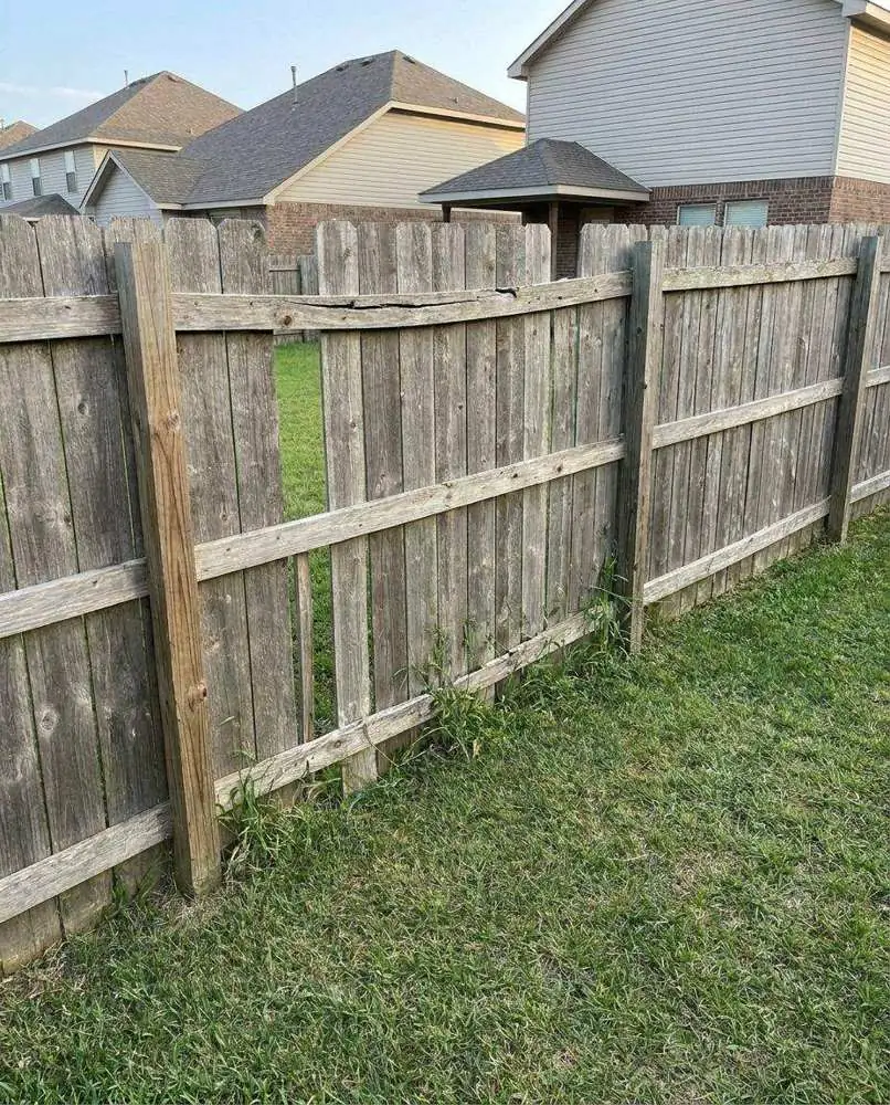 Broken fence before repair