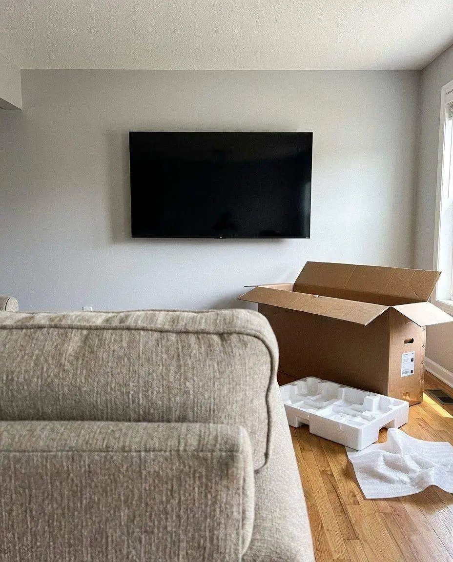 TV mounted on the wall with no visible cables